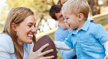 Mother with Toddler and Foot Ball 367 x 200